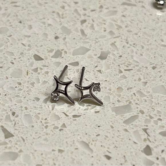 925 Sterling Silver Hollow Cubic Zirconia Star Design Stud Earrings - Picture 7 of 9